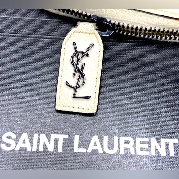 Saint Laurent Handbags - Saint Laurent Beige and Black wallet with gunmetal wristlet chain.